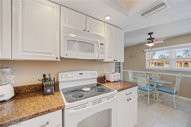 kitchen featuring light tile patterned floors, visible vents, white cabinets, ceiling fan, and white appliances