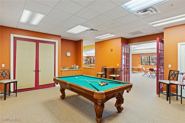 rec room featuring visible vents, a paneled ceiling, pool table, french doors, and carpet floors