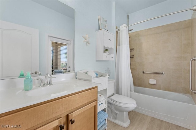 bathroom featuring vanity, wood finished floors, toilet, and shower / tub combo with curtain