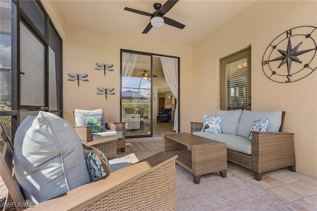 view of patio featuring ceiling fan and outdoor lounge area