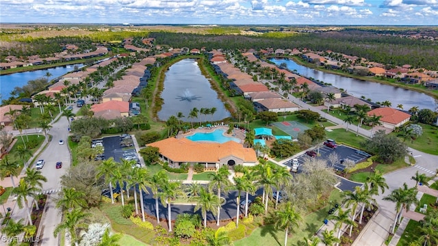 aerial view featuring a water view and a residential view