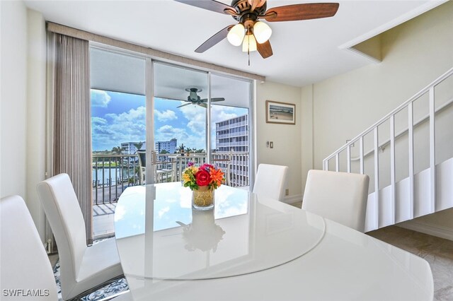 5 Bluebill Ave Unit 511, Naples, FL 34108 - dining area featuring plenty of natural light and ceiling fan