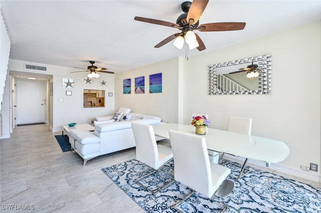 dining area with baseboards and visible vents