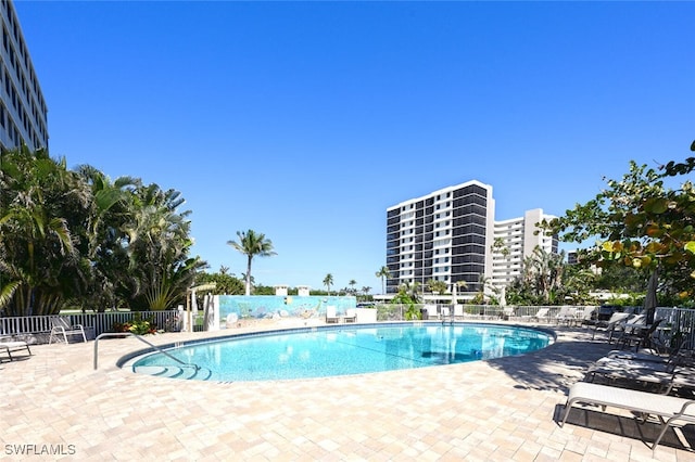 5 Bluebill Ave Unit 511, Naples, FL 34108 - community pool with a patio area