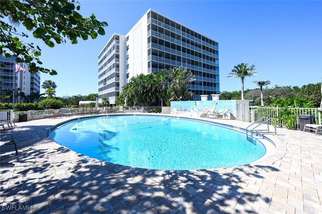 5 Bluebill Ave Unit 511, Naples, FL 34108 - community pool featuring a patio area