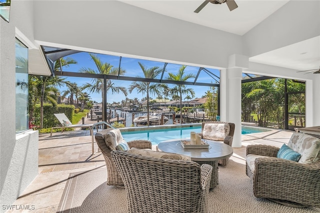 1015 Goldenrod Ave, Marco Island, FL 34145 - exterior space with a ceiling fan and glass enclosure