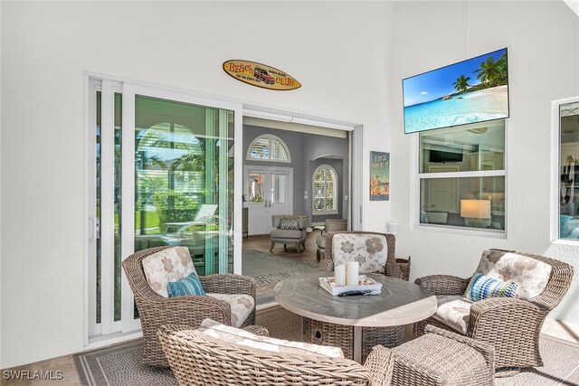 1015 Goldenrod Ave, Marco Island, FL 34145 - sunroom / solarium featuring arched walkways