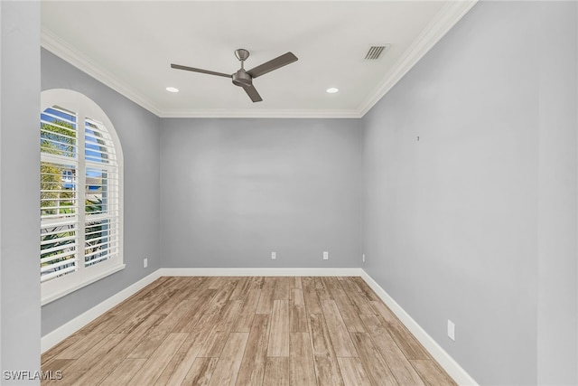 1015 Goldenrod Ave, Marco Island, FL 34145 - spare room with ornamental molding, light wood-style flooring, visible vents, and baseboards