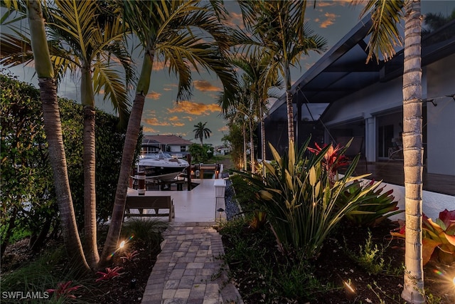 1015 Goldenrod Ave, Marco Island, FL 34145 - dock area with boat lift and a lanai
