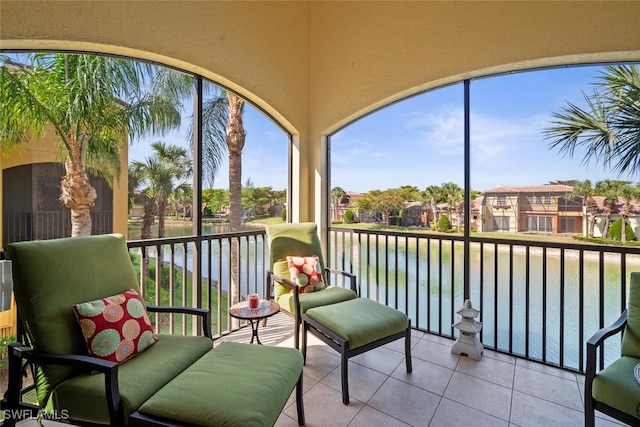 sunroom with a water view
