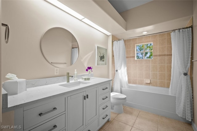 full bathroom with shower / bath combo, vanity, tile patterned flooring, and toilet