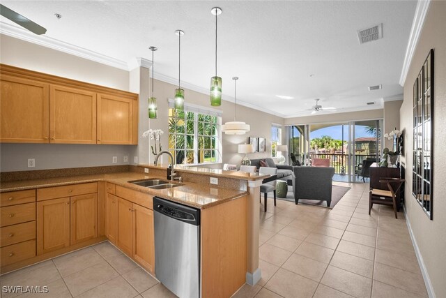 kitchen with dishwasher, visible vents, a sink, light tile patterned flooring, and a peninsula