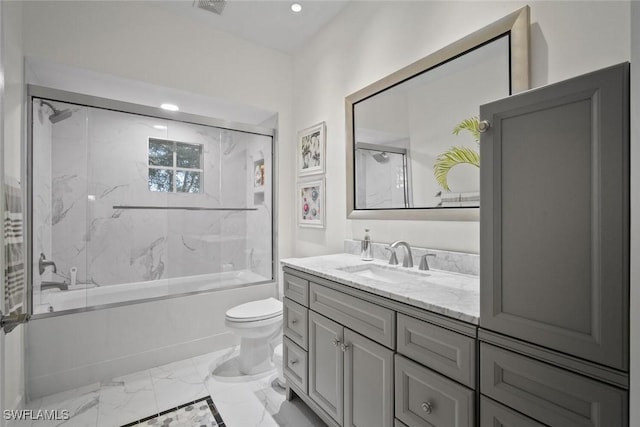 bathroom featuring marble finish floor, visible vents, toilet, vanity, and  shower combination