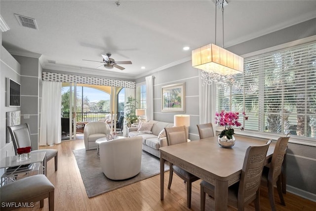 interior space with visible vents and a ceiling fan