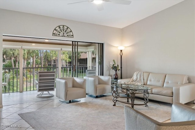 tiled living area with a ceiling fan