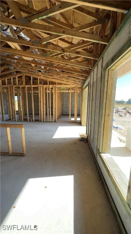 miscellaneous room featuring lofted ceiling