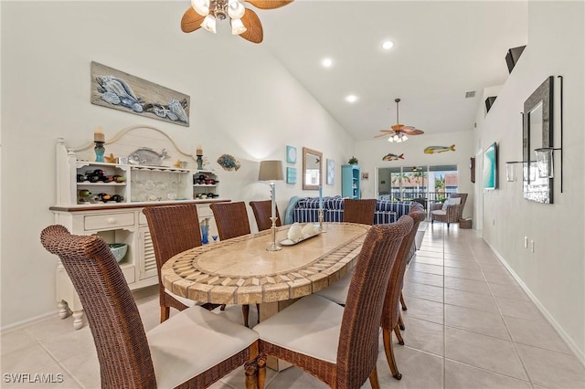 dining room with light tile patterned floors, recessed lighting, ceiling fan, high vaulted ceiling, and baseboards