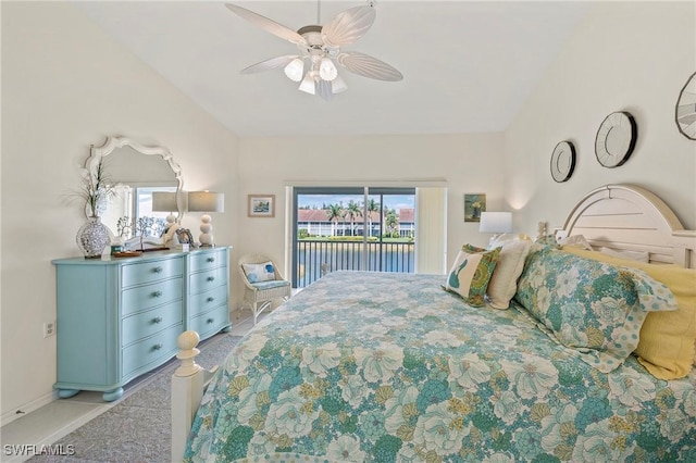 bedroom with a ceiling fan, access to outside, multiple windows, and light carpet