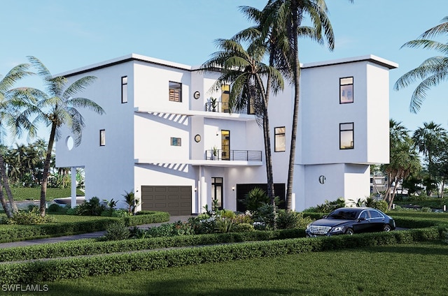 view of front of property featuring stucco siding, a front lawn, a balcony, and an attached garage