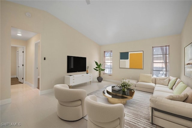 living room with lofted ceiling, light tile patterned floors, and baseboards