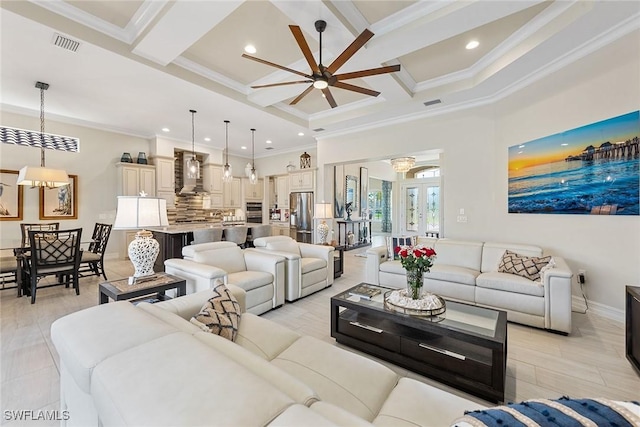 living room featuring a ceiling fan, beam ceiling, coffered ceiling, and crown molding