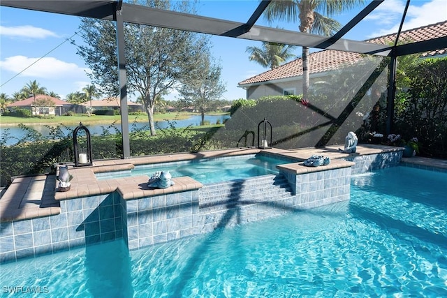 view of pool featuring a pool with connected hot tub, glass enclosure, and a water view