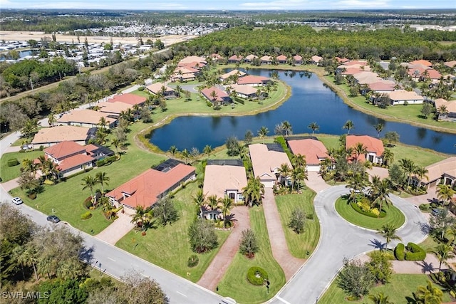 bird's eye view with a water view and a residential view