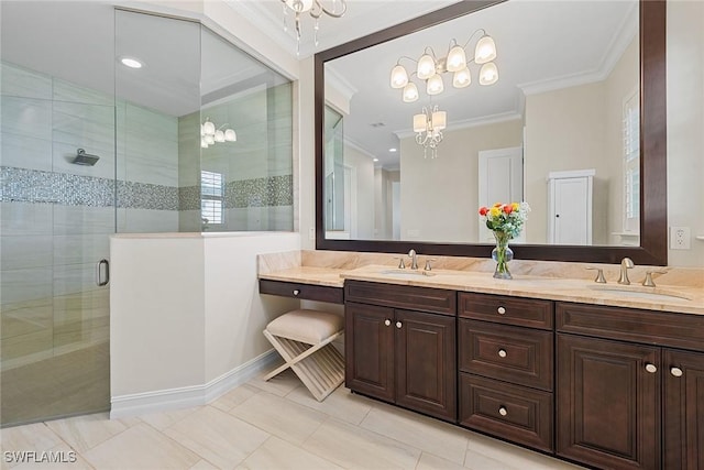 bathroom with double vanity, a stall shower, crown molding, and a sink