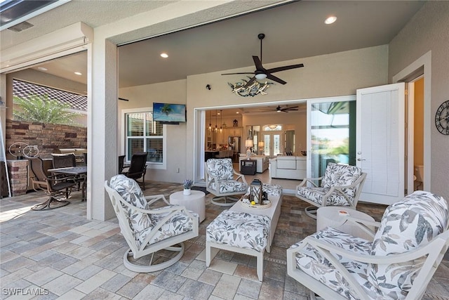 view of patio with an outdoor living space and outdoor dining space