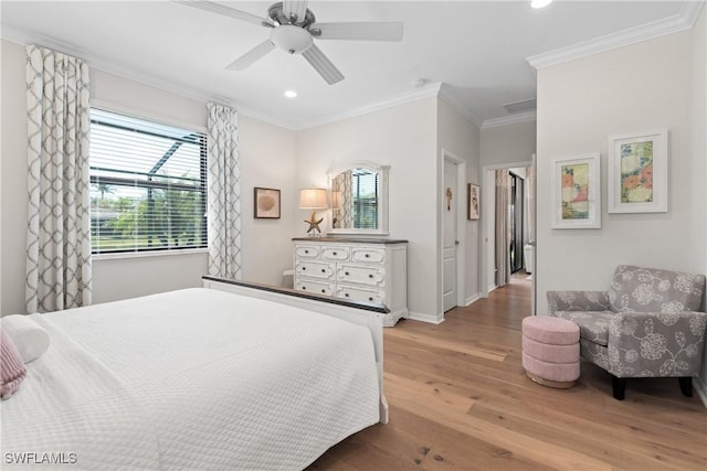 bedroom featuring ceiling fan, recessed lighting, wood finished floors, baseboards, and ornamental molding