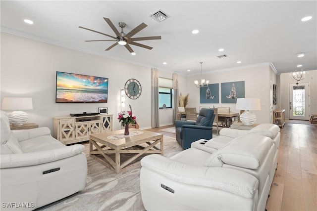 living area featuring recessed lighting, light wood-style flooring, visible vents, and ornamental molding