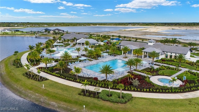 birds eye view of property featuring a residential view and a water view