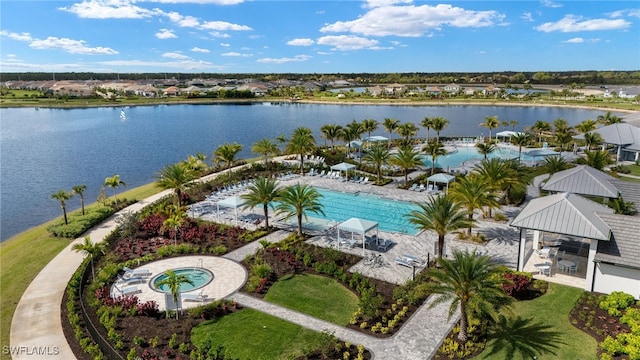 birds eye view of property featuring a water view