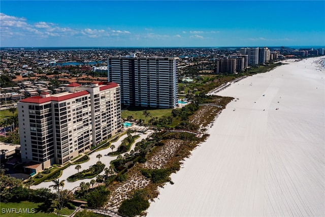 bird's eye view featuring a water view and a view of city