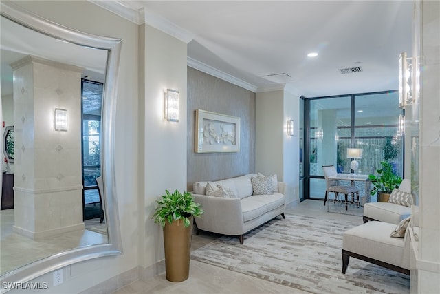 interior space featuring ornamental molding and visible vents