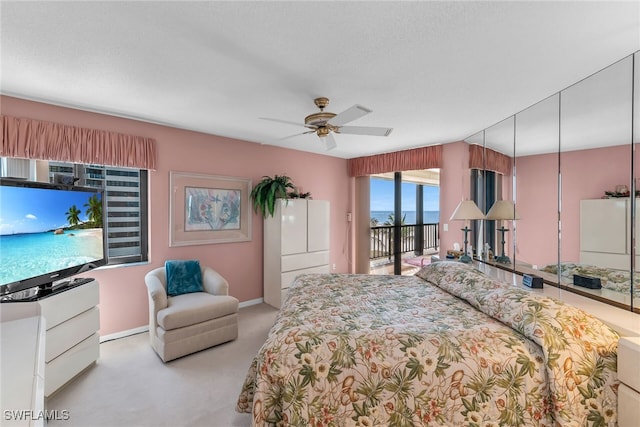 bedroom with ceiling fan, carpet floors, access to outside, and baseboards