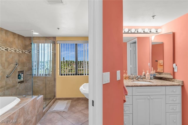 full bath featuring visible vents, vanity, tile patterned floors, a stall shower, and tiled tub