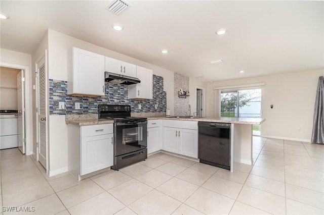 kitchen with tasteful backsplash, a peninsula, under cabinet range hood, black appliances, and a sink