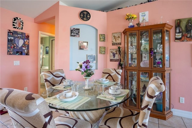 dining space featuring tile patterned floors