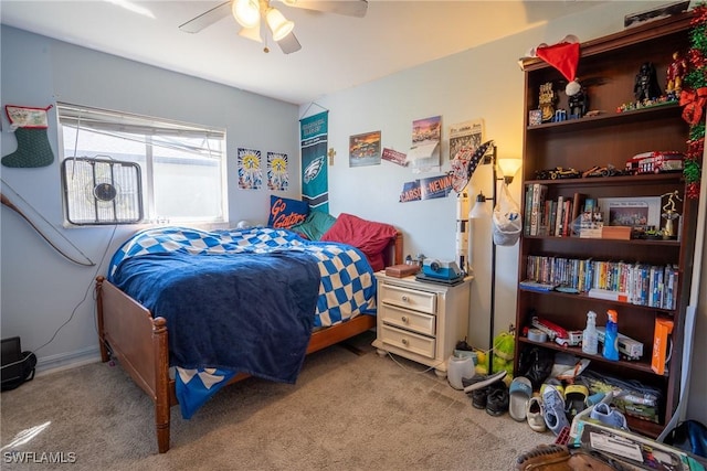 carpeted bedroom featuring a ceiling fan