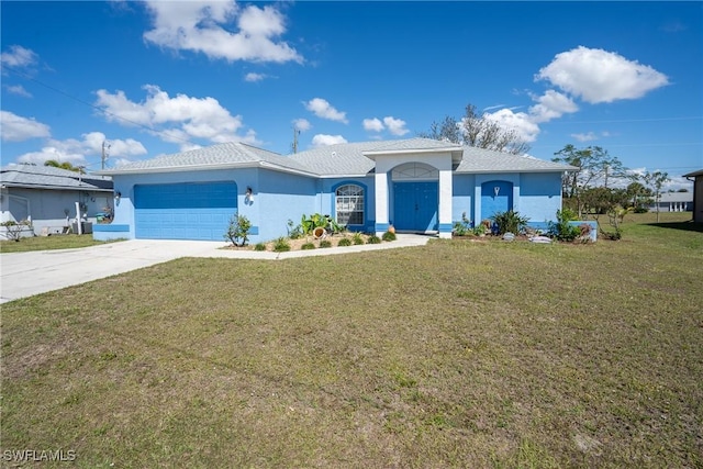 single story home featuring driveway, stucco siding, an attached garage, and a front yard