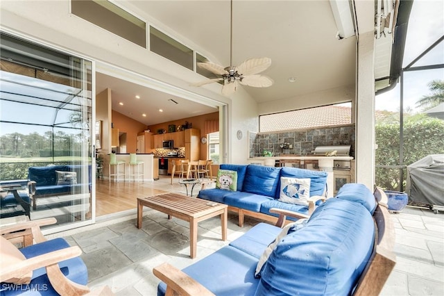 sunroom / solarium with ceiling fan