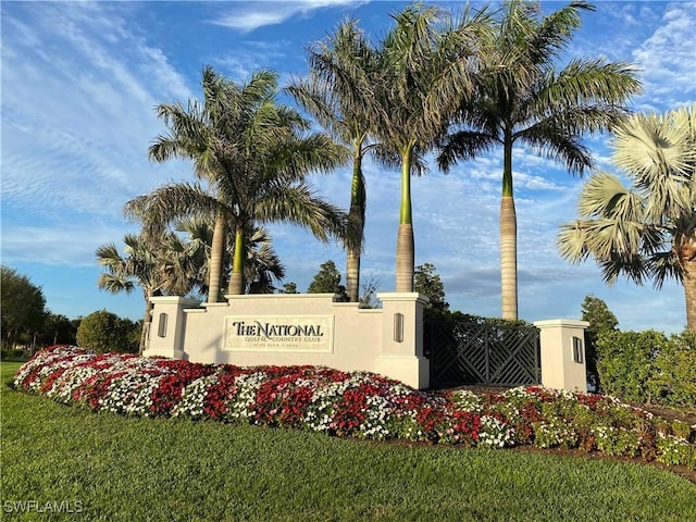 community sign with a lawn