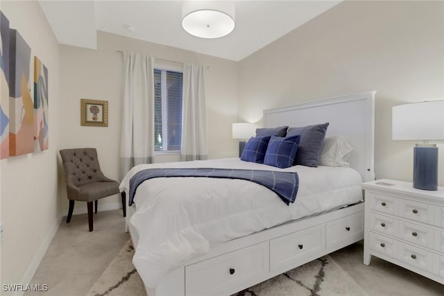 bedroom featuring baseboards