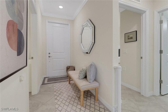 hallway featuring ornamental molding, recessed lighting, and baseboards