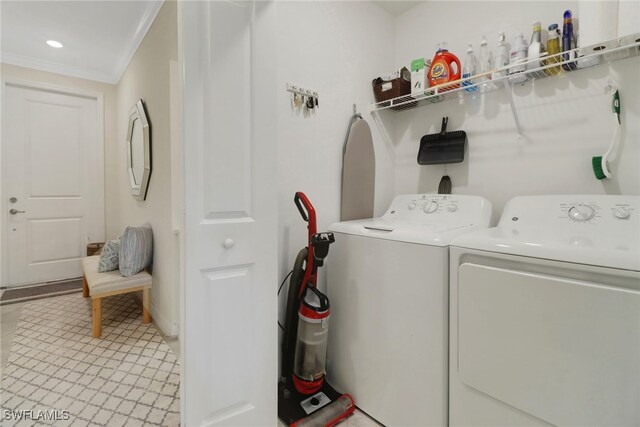 laundry area with separate washer and dryer, recessed lighting, and crown molding