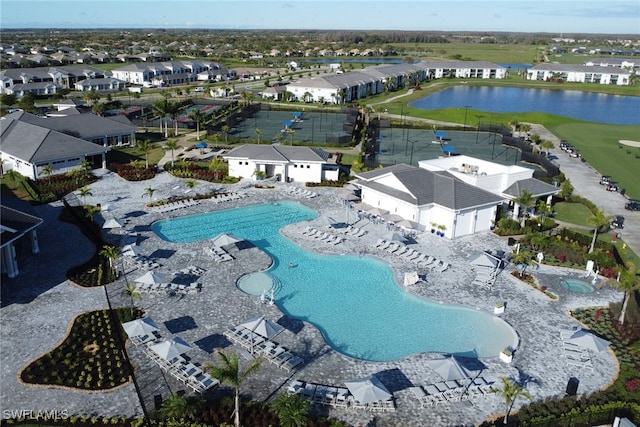 aerial view featuring a water view and a residential view