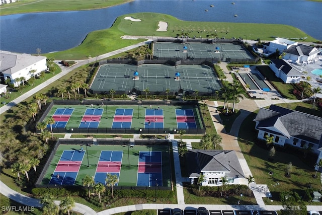 birds eye view of property featuring a water view and golf course view