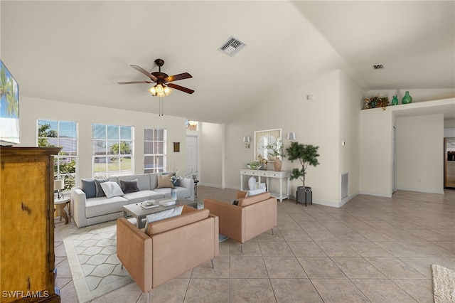 living area featuring light tile patterned floors, visible vents, and a ceiling fan