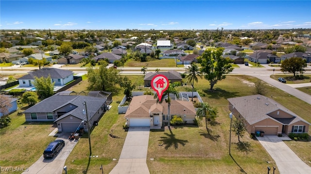 drone / aerial view with a residential view